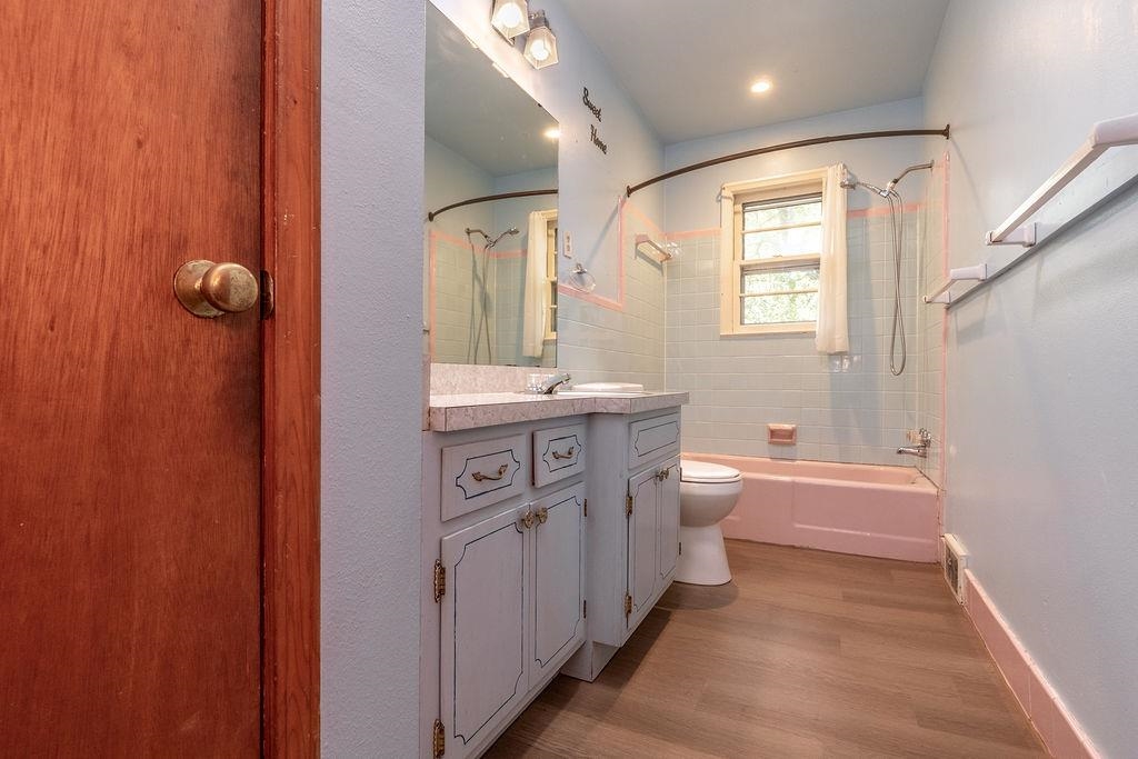 5595 Raleigh Lagrange Road Memphis, TN 38134 - Photo 23 of 29 a bathroom with a sink a toilet and shower