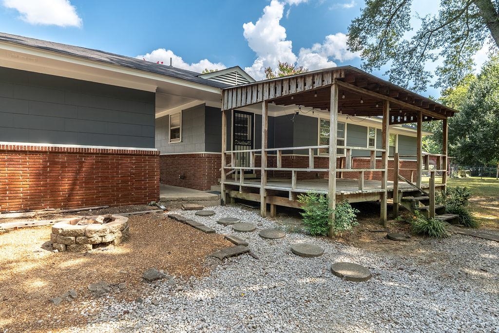 5595 Raleigh Lagrange Road Memphis, TN 38134 - Photo 2 of 29 a front view of a house with parking space