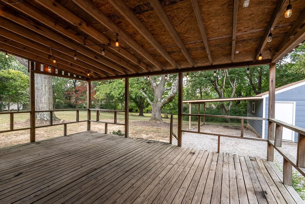 5595 Raleigh Lagrange Road Memphis, TN 38134 - Photo 4 of 29 a view of roof deck with a flat screen tv