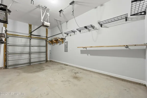 a view of a room with racks on the wall