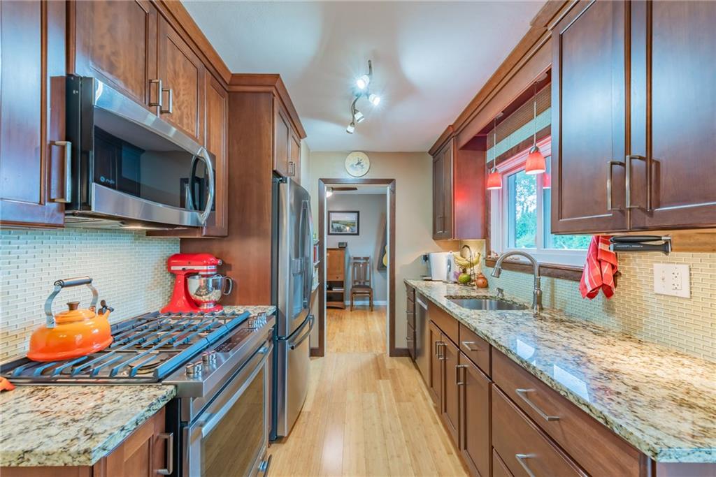 62 Barbara Road Latrobe, PA 15650 - Photo 7 of 21 With granite counter-tops and stainless steel appliances