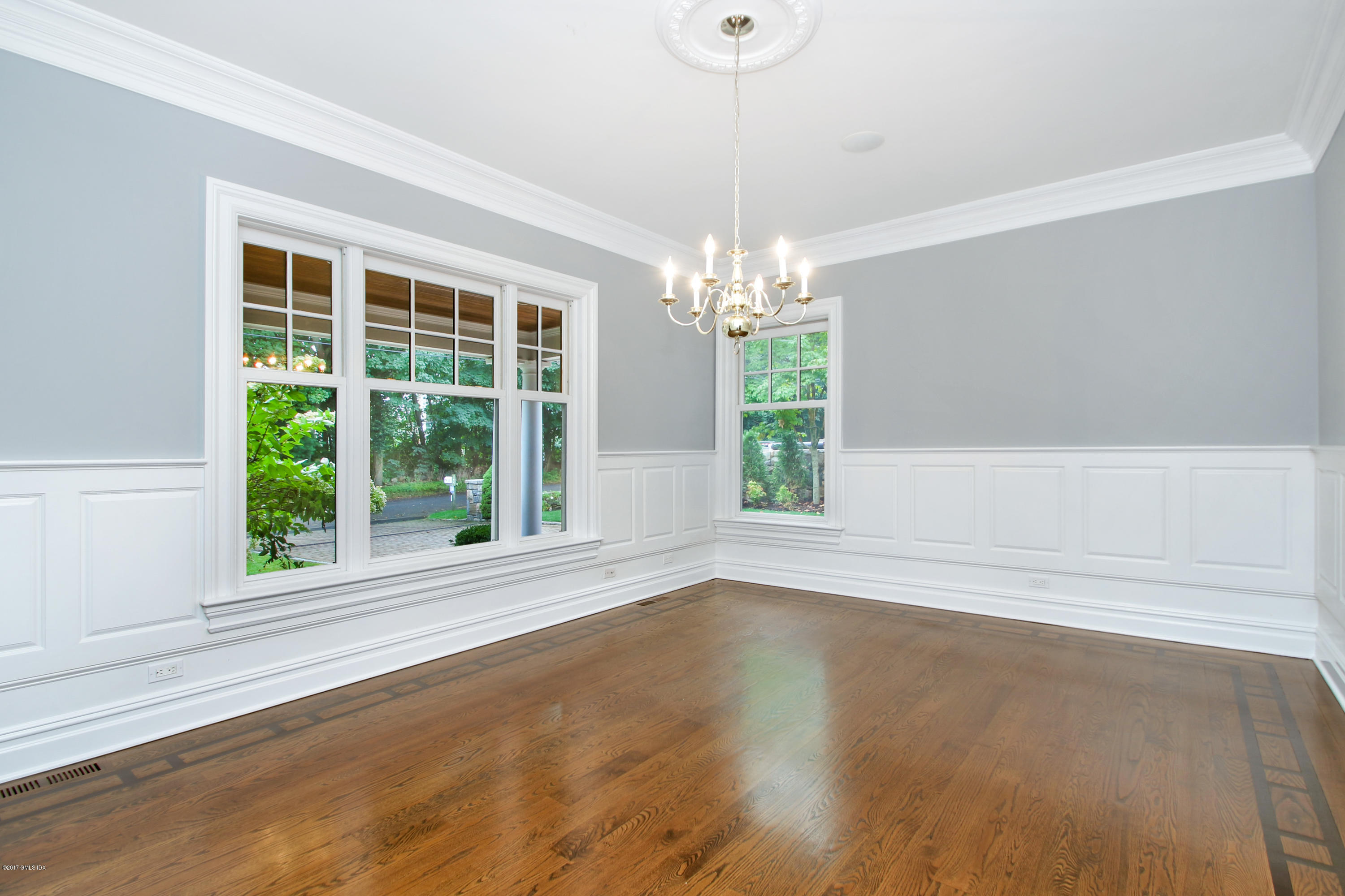 15 Juniper Lane Riverside, CT 06878 - Photo 7 of 36 a view of an empty room with wooden floor and a window
