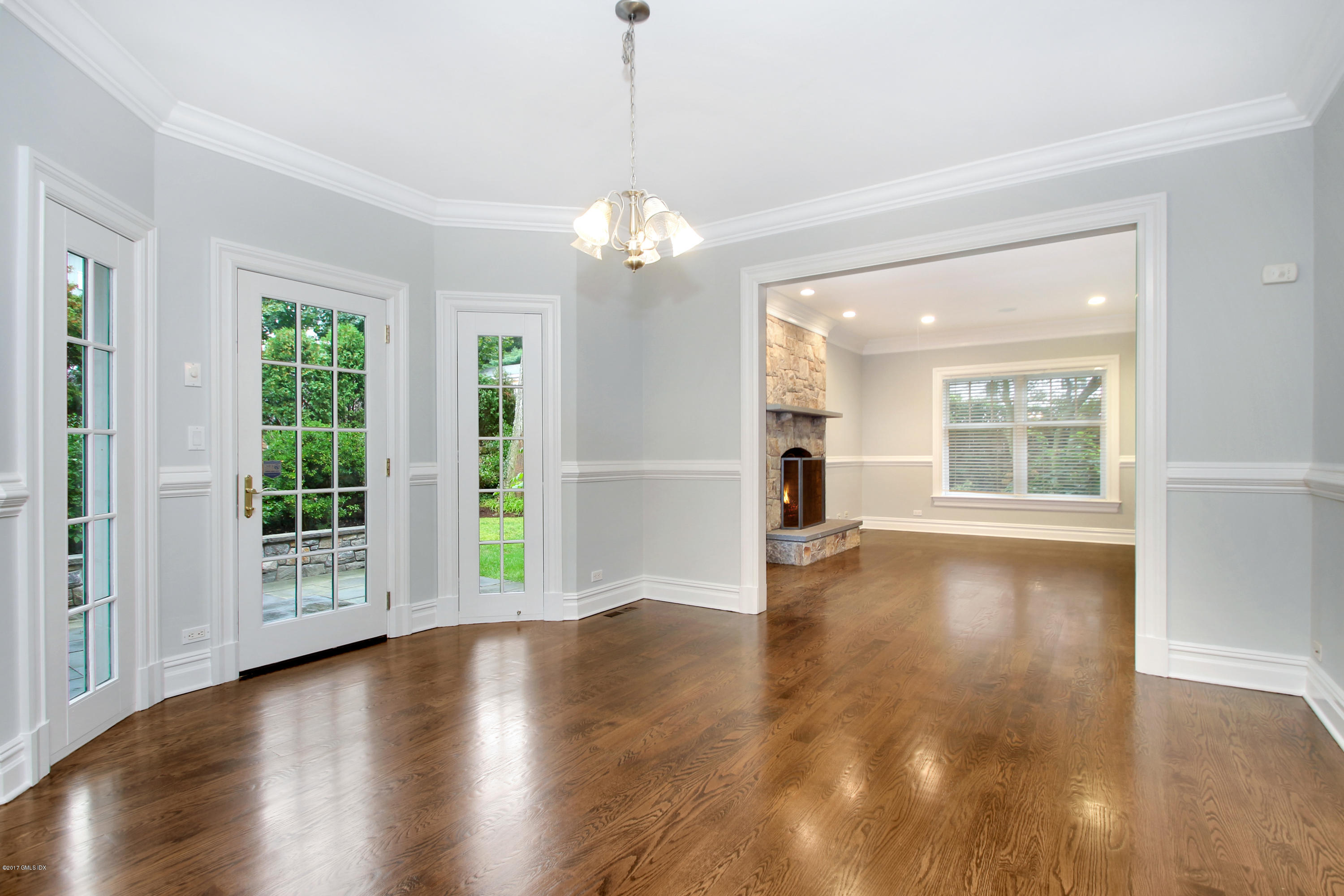 15 Juniper Lane Riverside, CT 06878 - Photo 8 of 36 a view of an empty room with wooden floor and a window