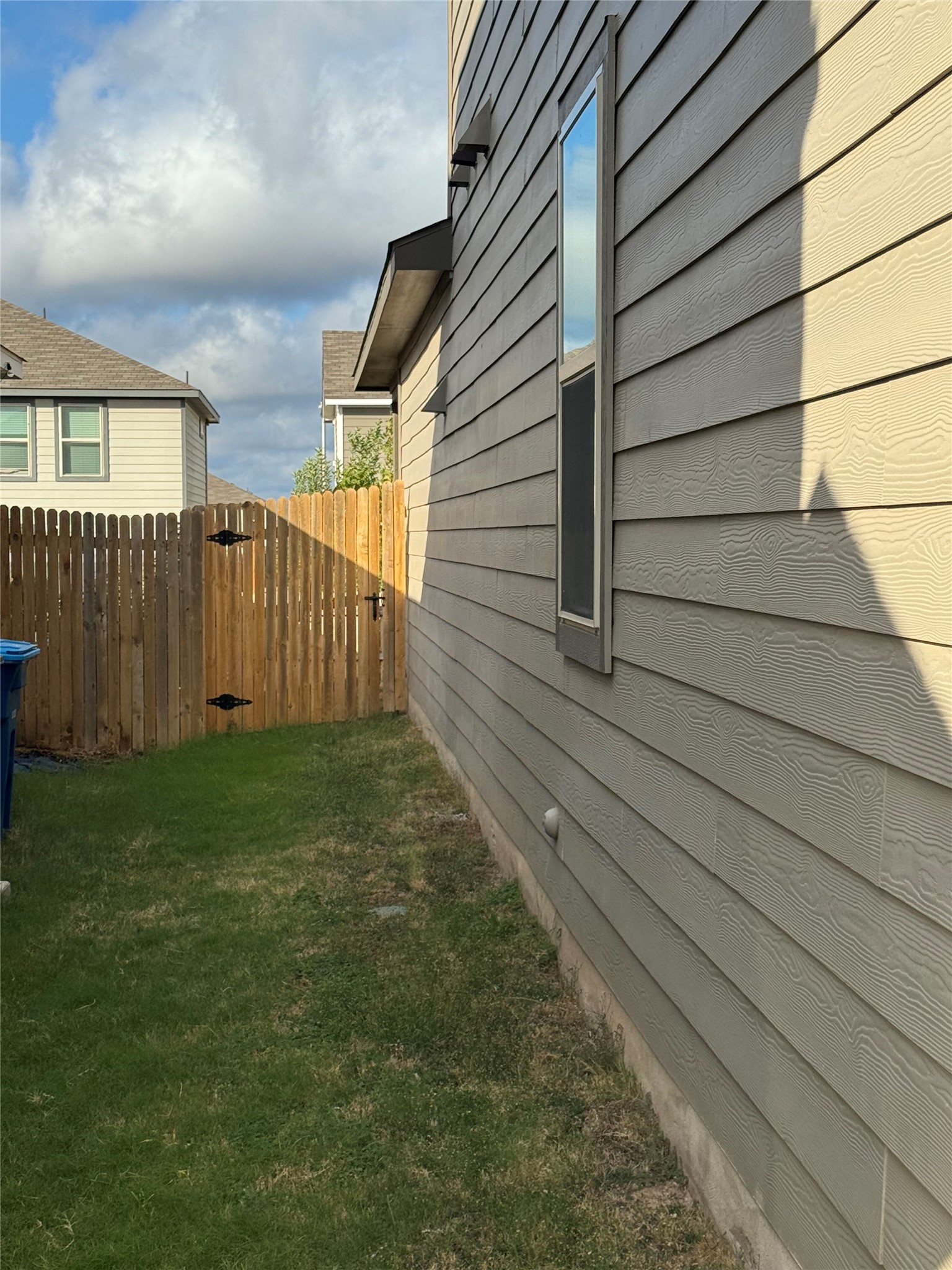 333 Capstone Road Liberty Hill, TX 78642 - Photo 2 of 40 View of home's exterior featuring a gate