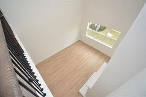 a backyard of a house with wooden fence
