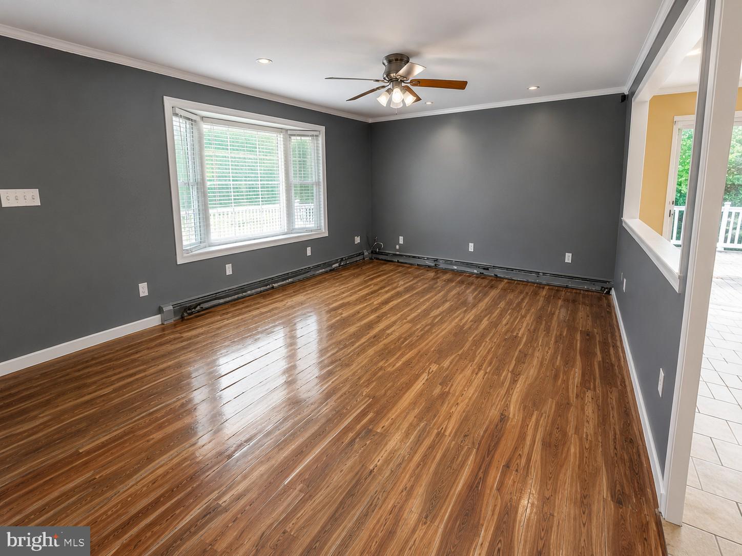 173 Arneys Mt Road Pemberton, NJ 08068 - Photo 7 of 24 wooden floor in an empty room with a window