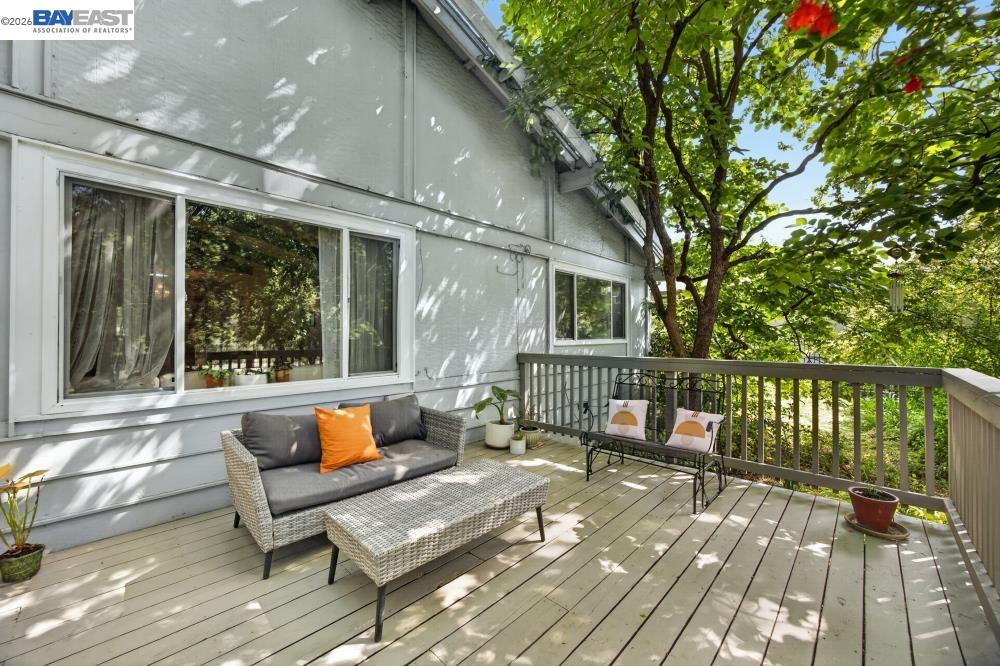 3590 Park Road Sacramento, CA 95841 - Photo 11 of 66 a balcony with wooden floor and outdoor seating