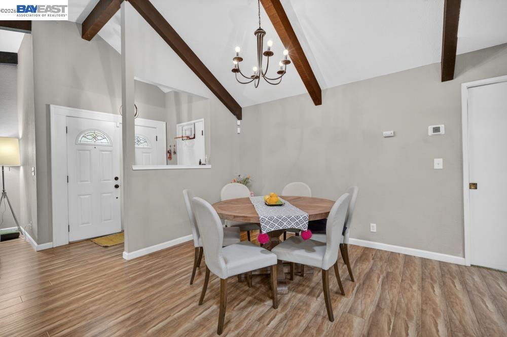 3590 Park Road Sacramento, CA 95841 - Photo 23 of 66 a view of a dining room with furniture and wooden floor