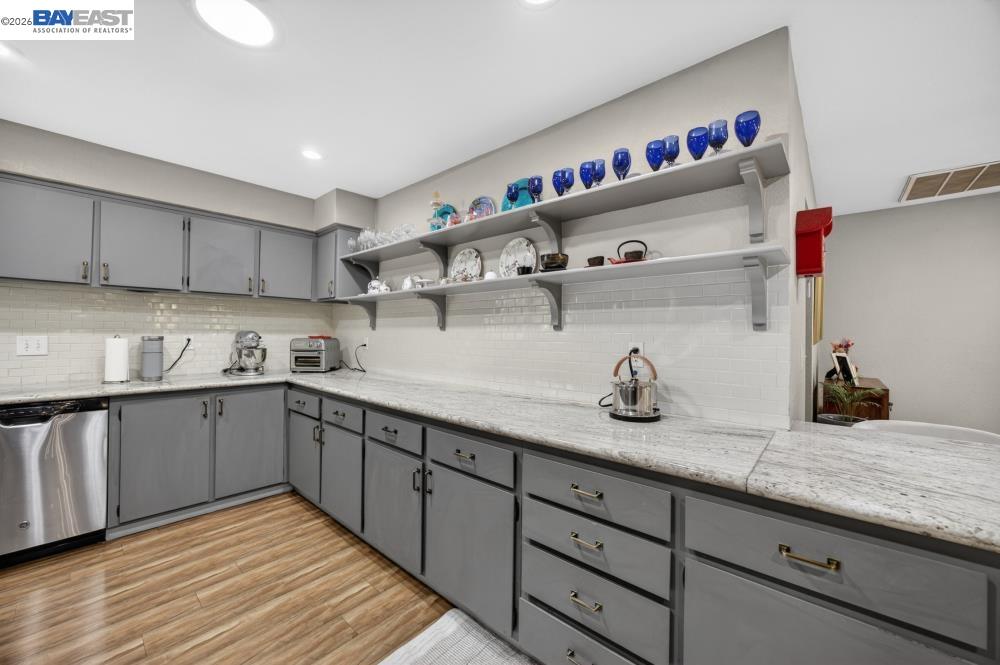 3590 Park Road Sacramento, CA 95841 - Photo 31 of 66 a kitchen with cabinets and window