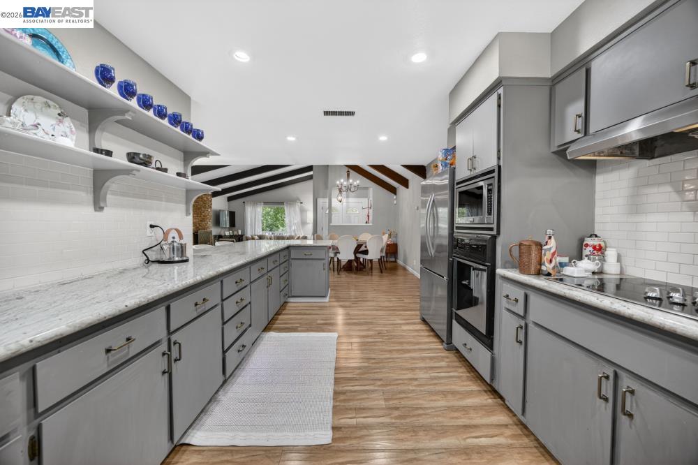 3590 Park Road Sacramento, CA 95841 - Photo 33 of 66 a large kitchen with stainless steel appliances lots of counter top space
