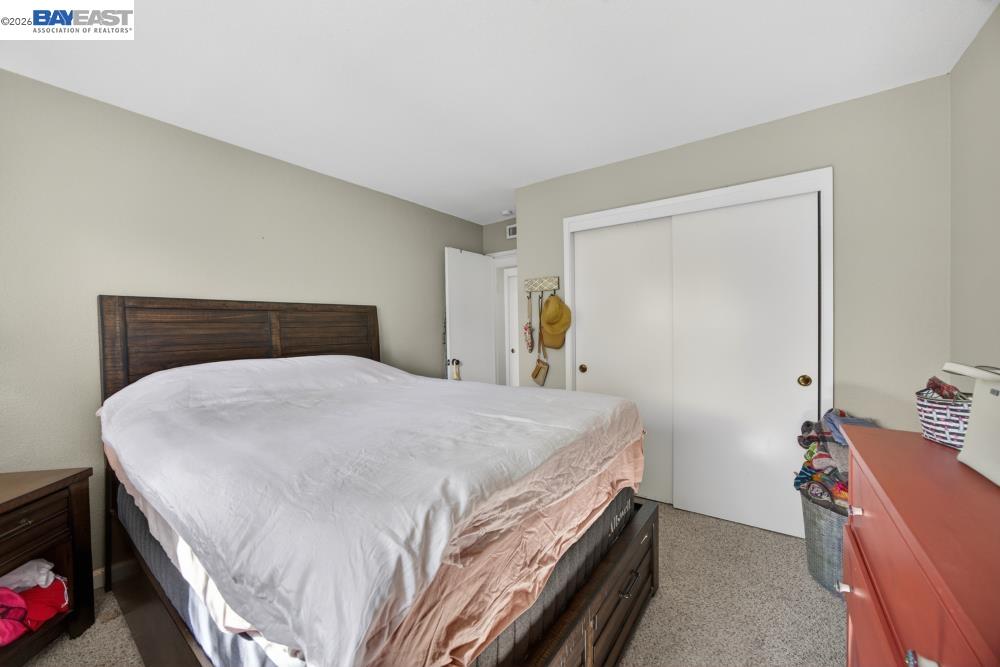 3590 Park Road Sacramento, CA 95841 - Photo 46 of 66 a bedroom with a bed and a dresser