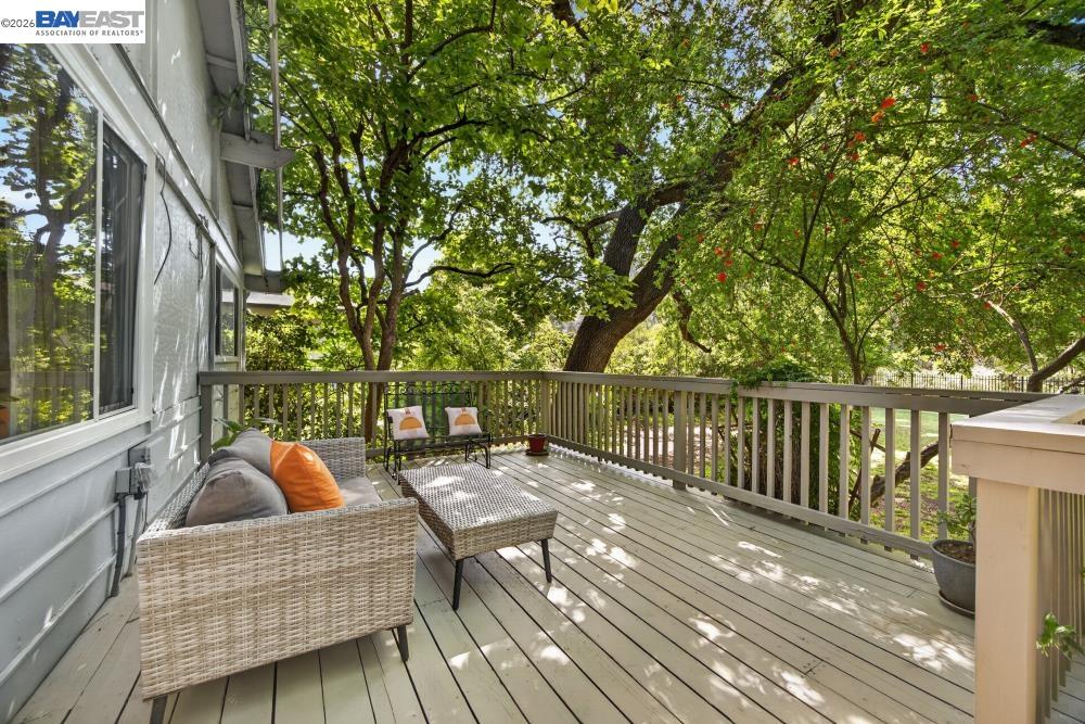 3590 Park Road Sacramento, CA 95841 - Photo 10 of 66 a balcony with wooden floor and furniture