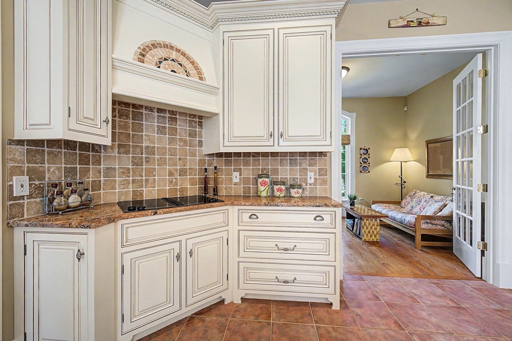 6 Trailside Way Norfolk, MA 02056 - Photo 13 of 42 a kitchen with stainless steel appliances granite countertop a sink and cabinets