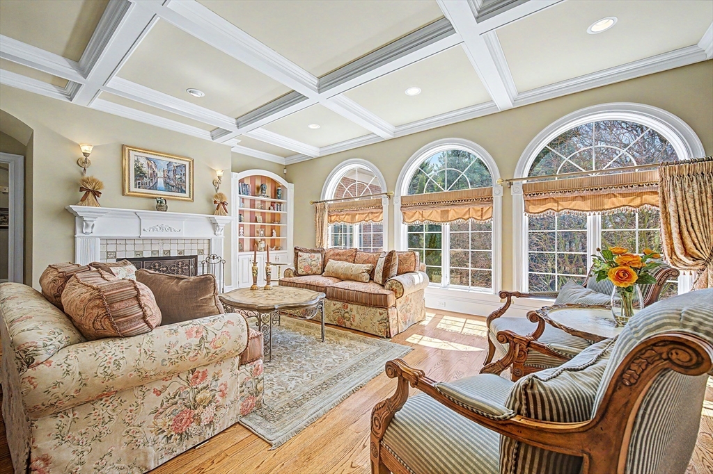 6 Trailside Way Norfolk, MA 02056 - Photo 18 of 42 a living room with furniture a fireplace and a large window