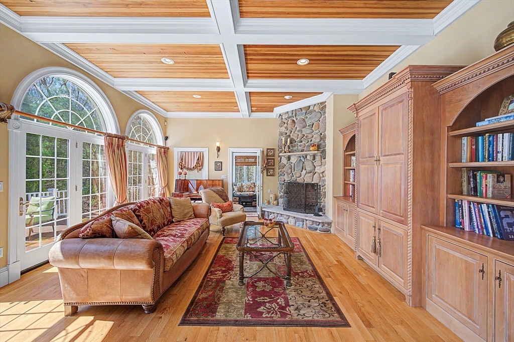 6 Trailside Way Norfolk, MA 02056 - Photo 20 of 42 a living room with furniture a rug and a large window
