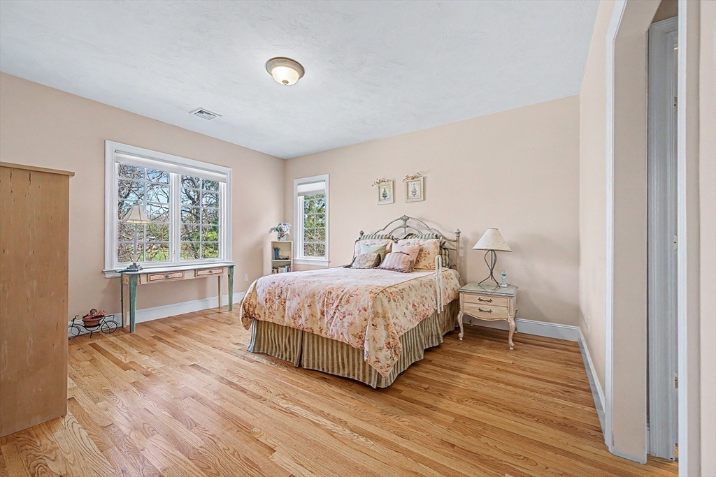 6 Trailside Way Norfolk, MA 02056 - Photo 29 of 42 a spacious bedroom with a bed and a window