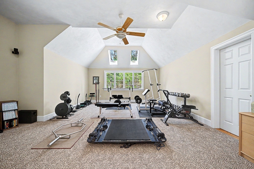 6 Trailside Way Norfolk, MA 02056 - Photo 37 of 42 a room with gym equipment and a large window