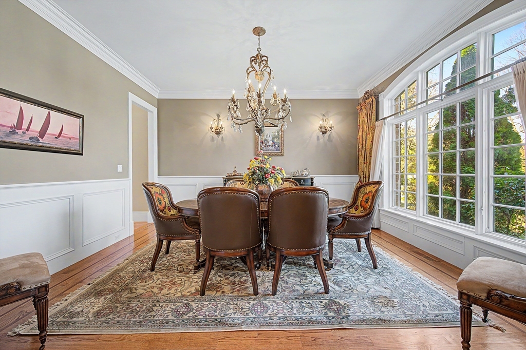 6 Trailside Way Norfolk, MA 02056 - Photo 5 of 42 a view of a dining room with furniture window and wooden floor