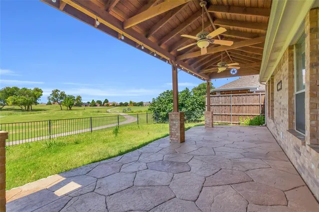 front view of a building with a yard