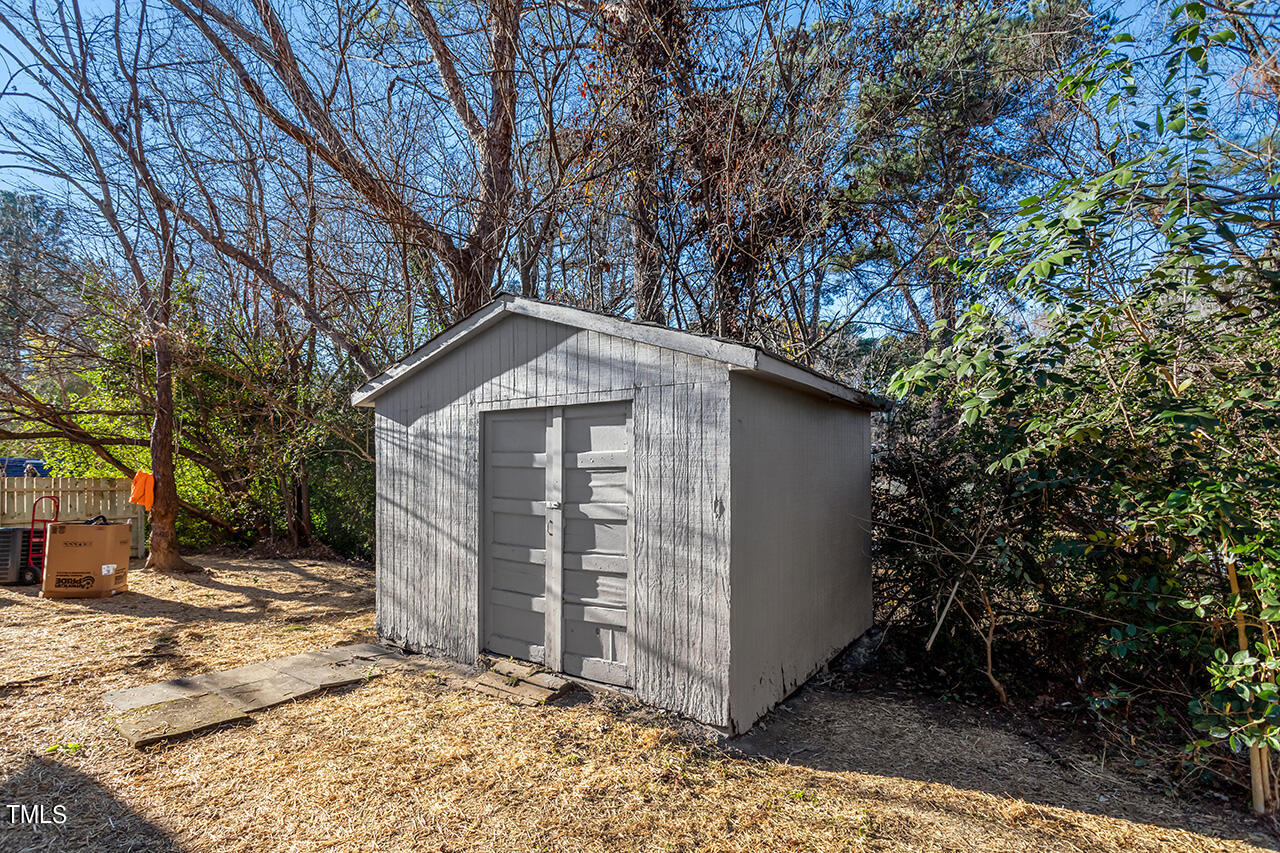 1209 Hazelnut Drive Raleigh, NC 27610 - Photo 24 of 24 a view of a house with a yard