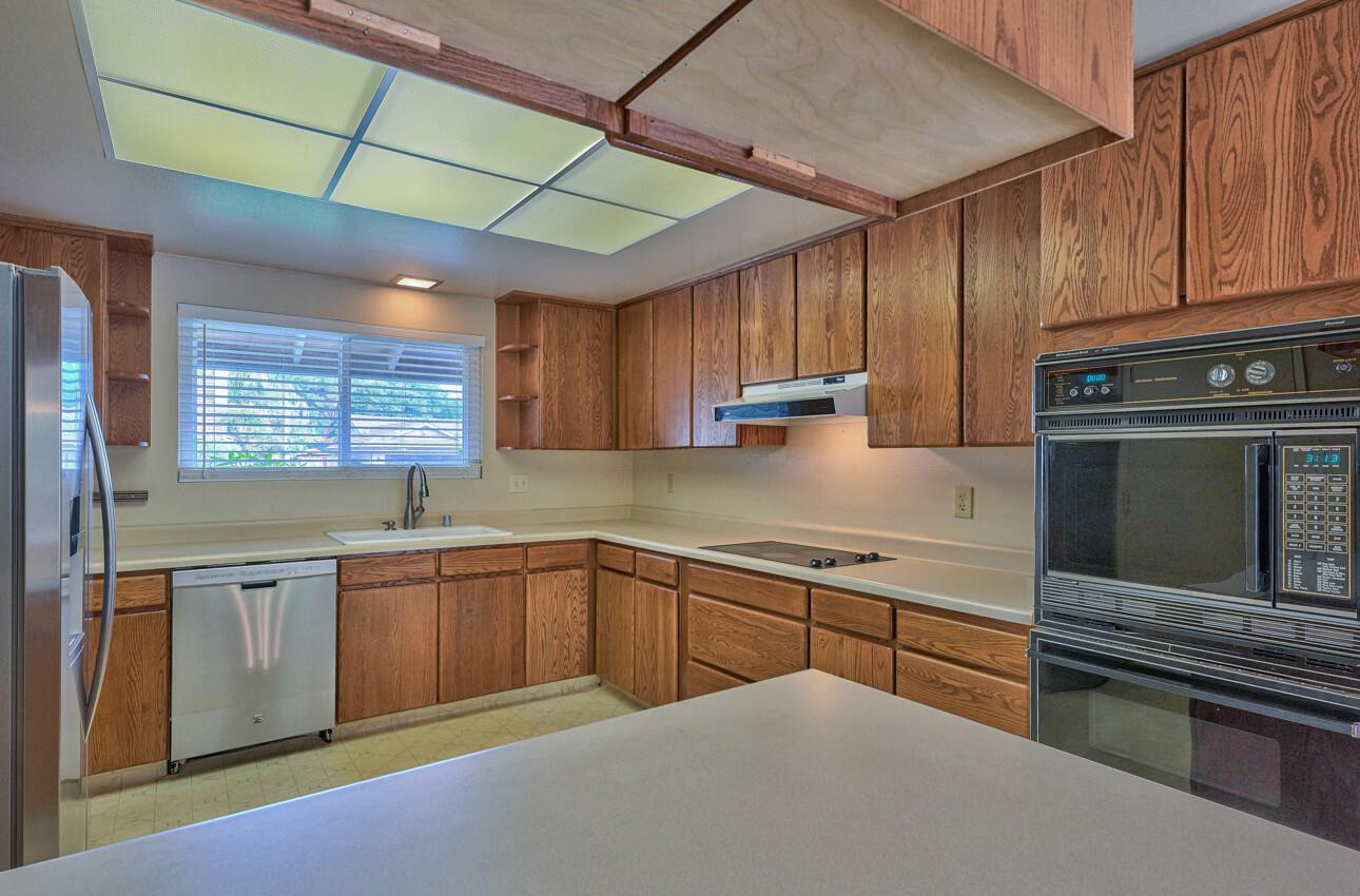 23007 Espada Drive Salinas, CA 93908 - Photo 12 of 39 a kitchen with sink cabinets and window