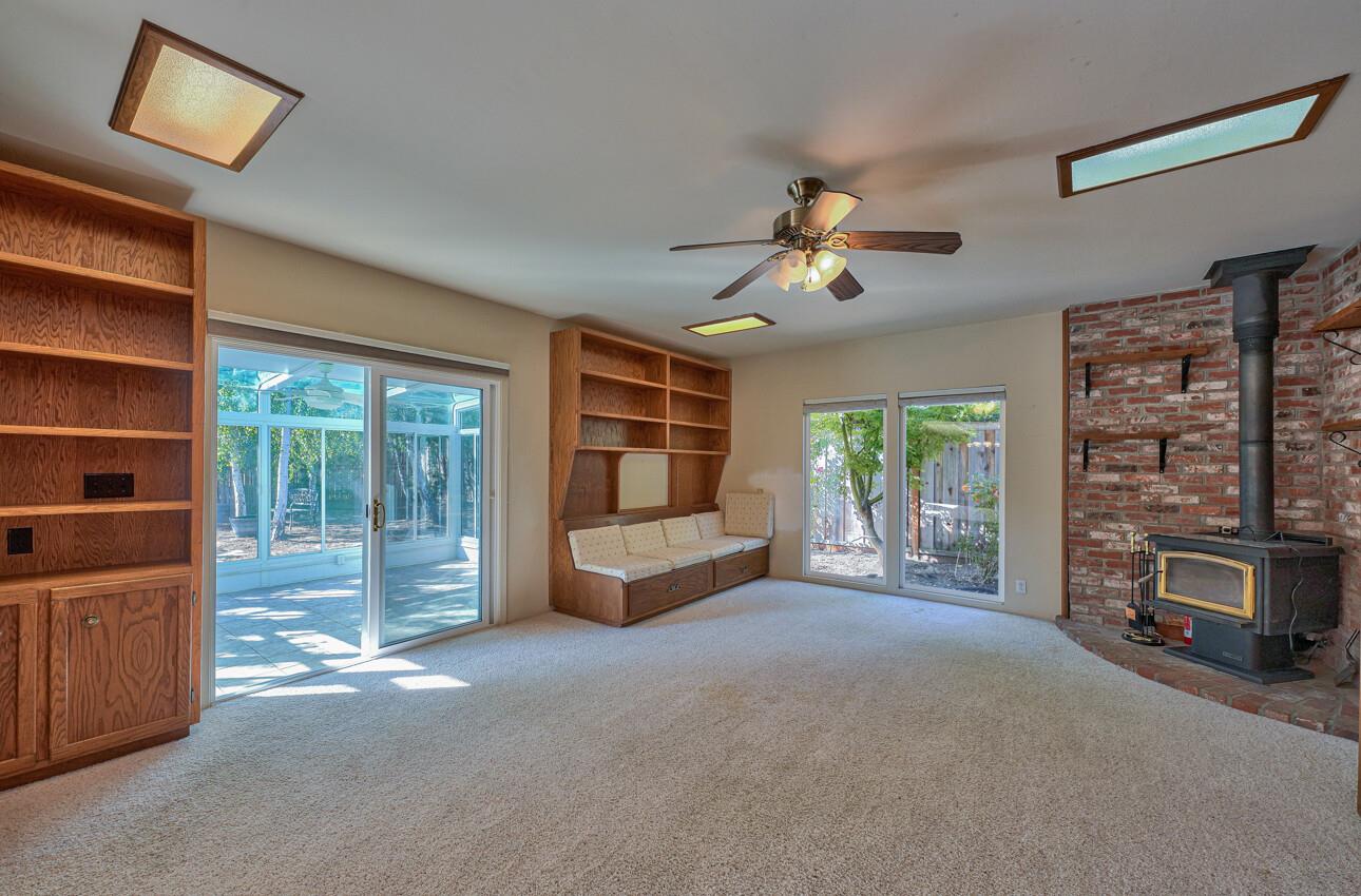 23007 Espada Drive Salinas, CA 93908 - Photo 14 of 39 a living room with furniture and a fireplace