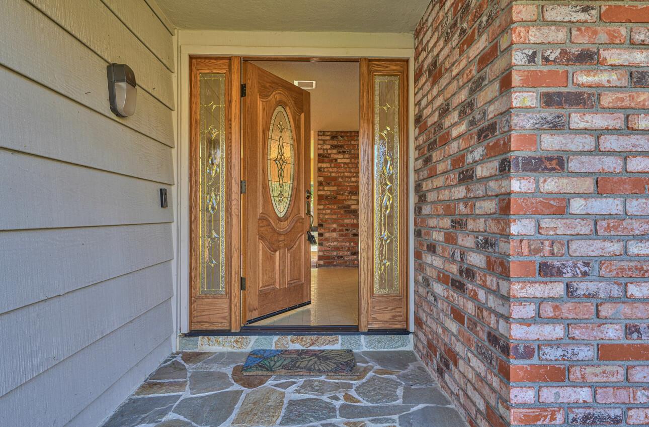 23007 Espada Drive Salinas, CA 93908 - Photo 3 of 39 a view of a brick house with a door