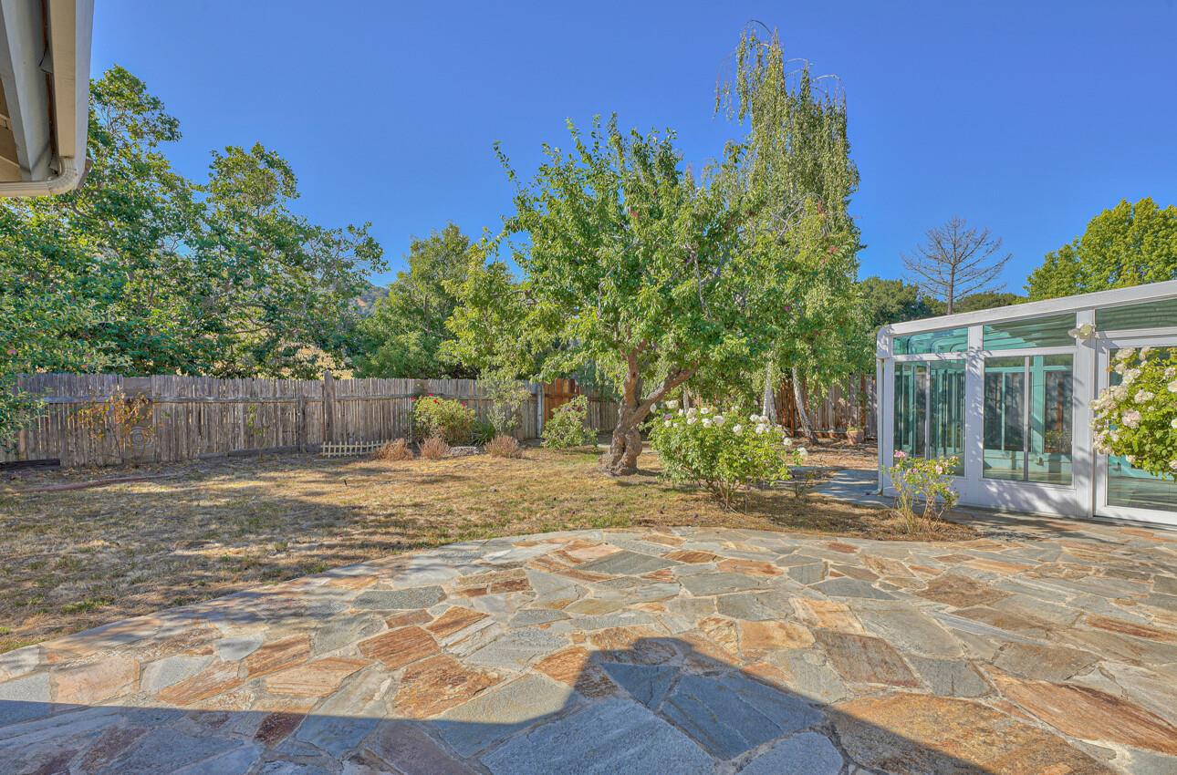 23007 Espada Drive Salinas, CA 93908 - Photo 31 of 39 a backyard of a house with table and chairs