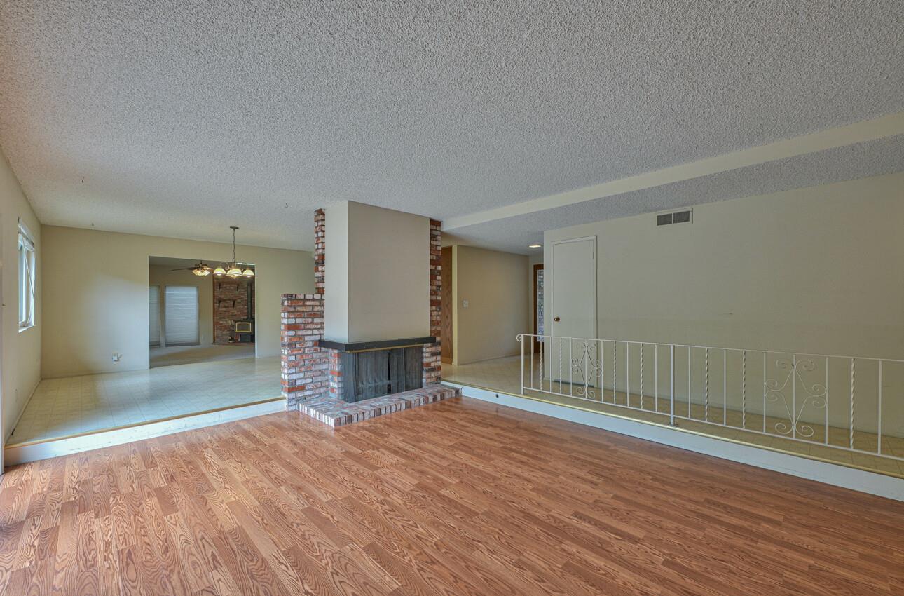 23007 Espada Drive Salinas, CA 93908 - Photo 6 of 39 a view of empty room with wooden floor