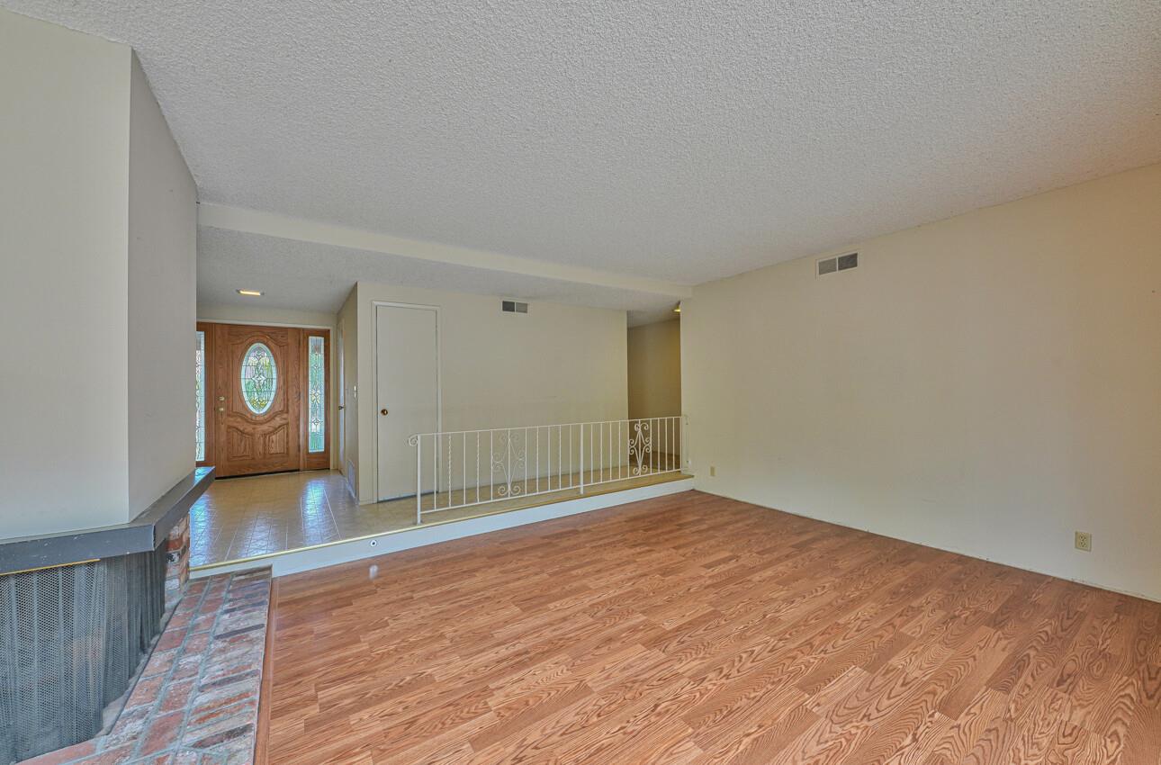23007 Espada Drive Salinas, CA 93908 - Photo 7 of 39 a view of empty room with wooden floor and fan