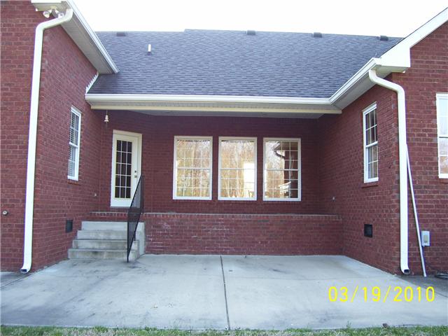 2395 Lights Chapel Road Greenbrier, TN 37073 - Photo 13 of 16 Covered rear porch is private and shaded in the afternoons.