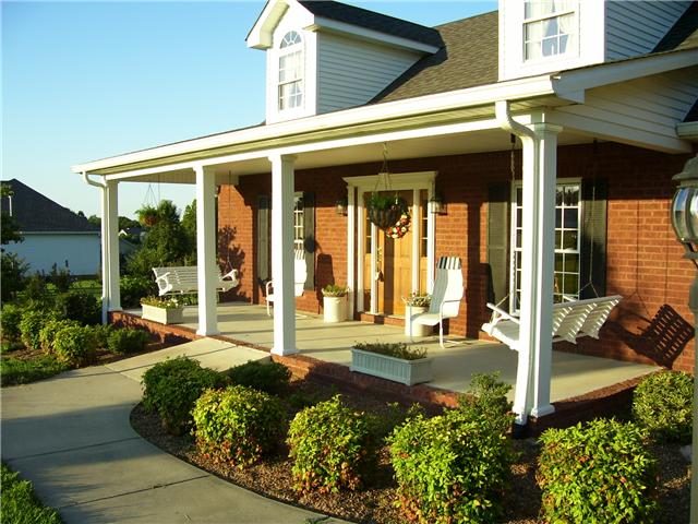 2395 Lights Chapel Road Greenbrier, TN 37073 - Photo 7 of 16 Wonderful front porch with swings