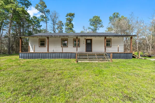 a house view with a garden space
