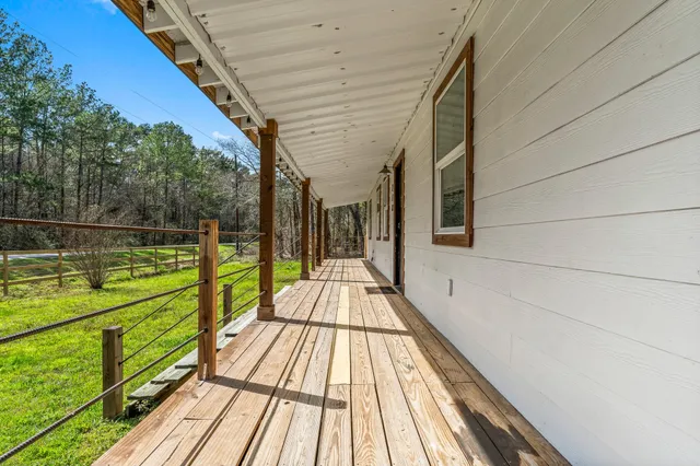 a view of balcony with a swimming pool