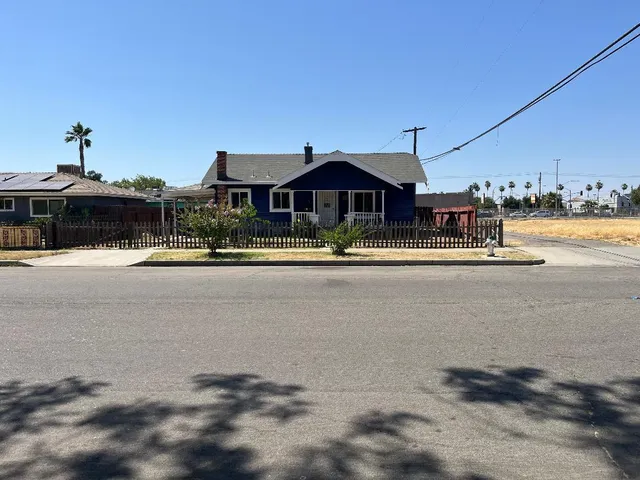 a front view of a house with a ocean view