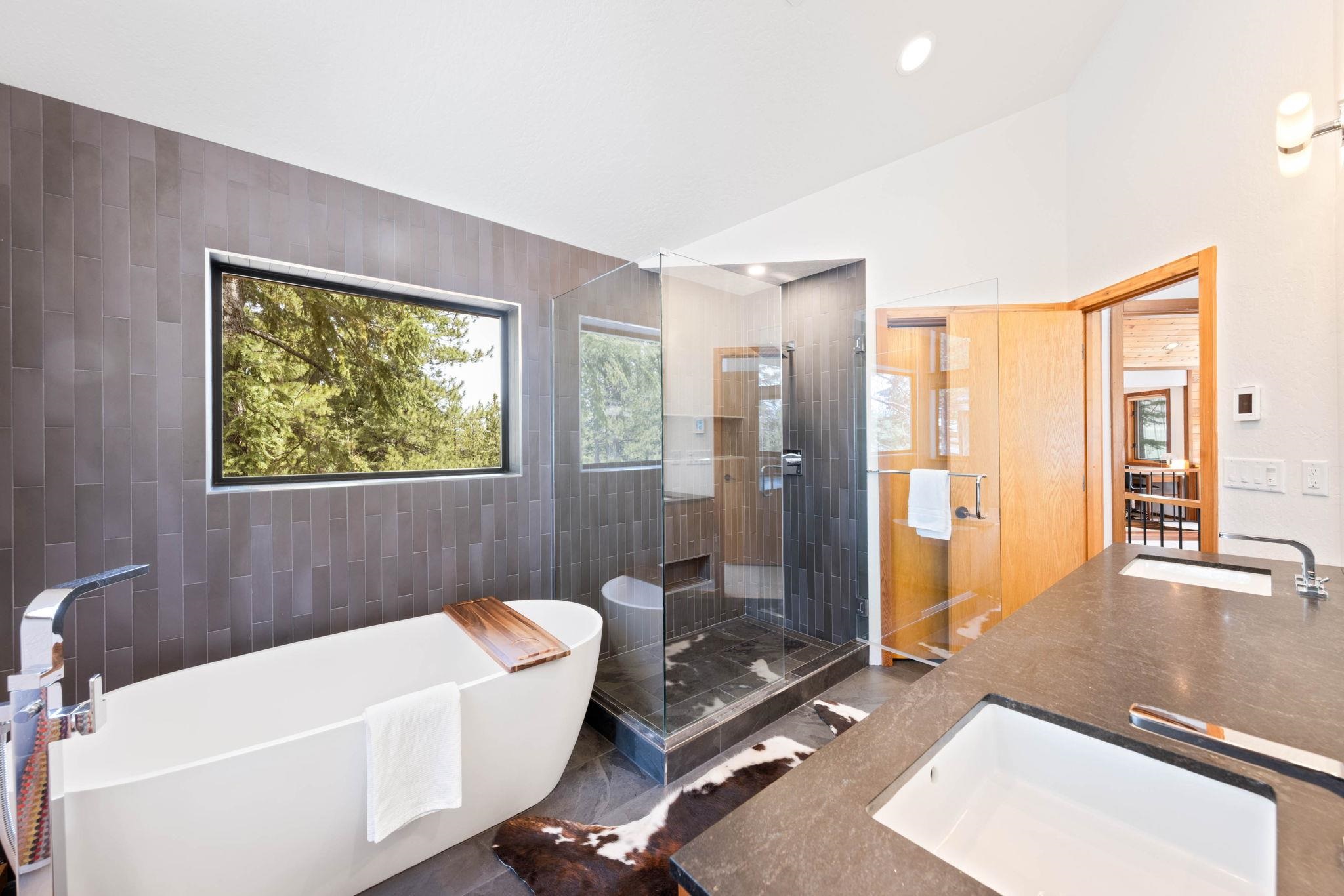 737 Conifer Truckee, CA 96161 - Photo 17 of 21 a bathroom with a sink a bathtub and next to a window