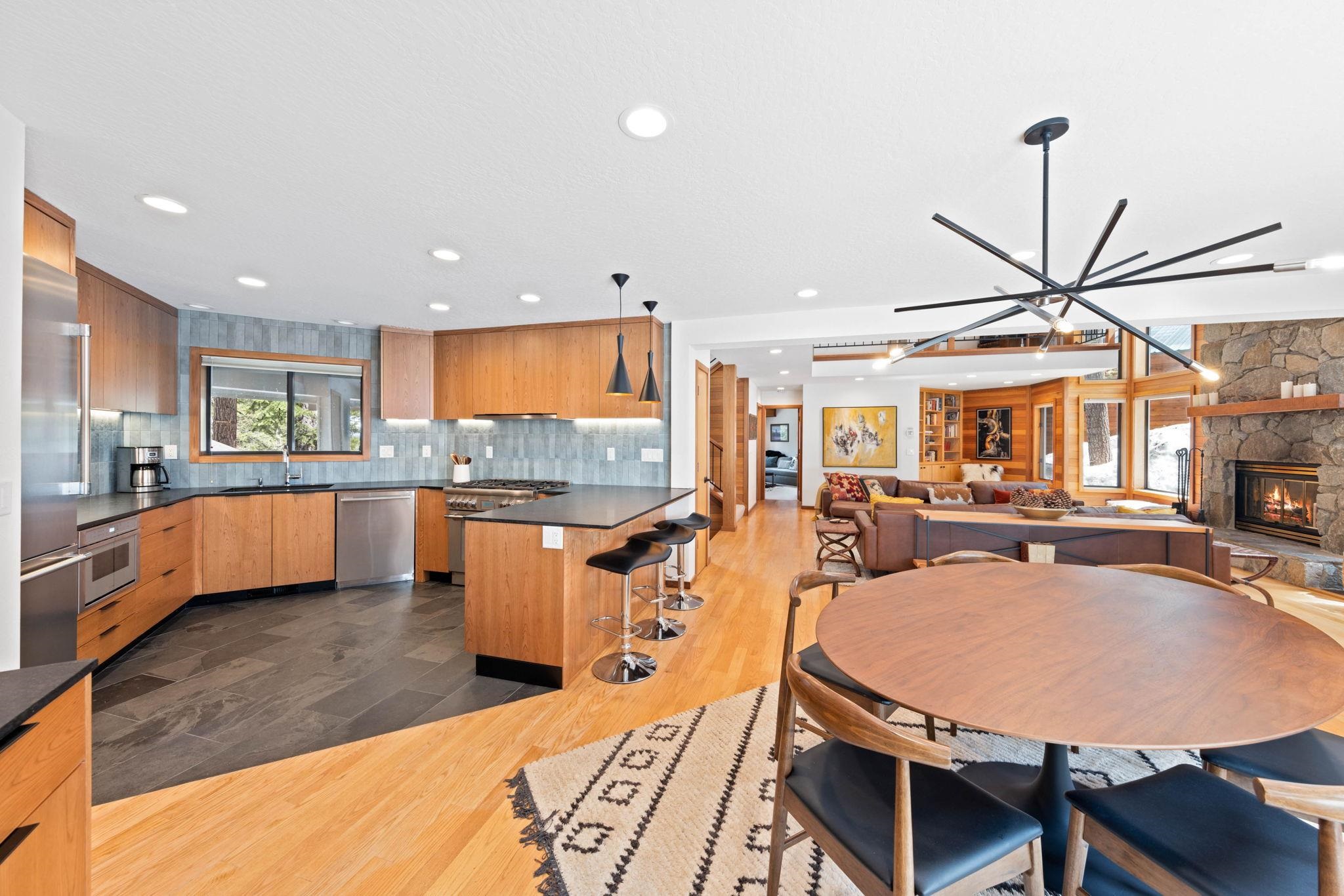 737 Conifer Truckee, CA 96161 - Photo 7 of 21 a large kitchen with a table and chairs