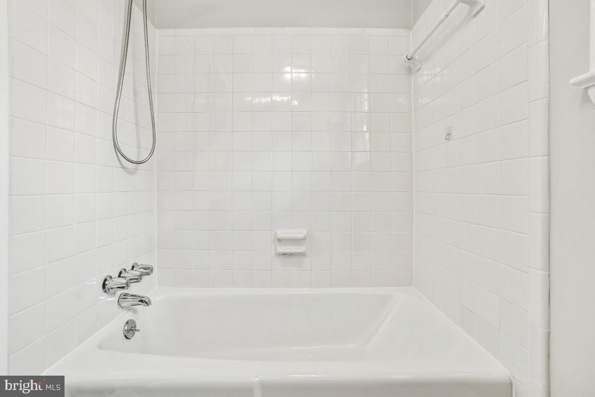 307 Indian Spring Drive Silver Spring, MD 20901 - Photo 20 of 40 Hall Bathroom with a Tub Shower Combination