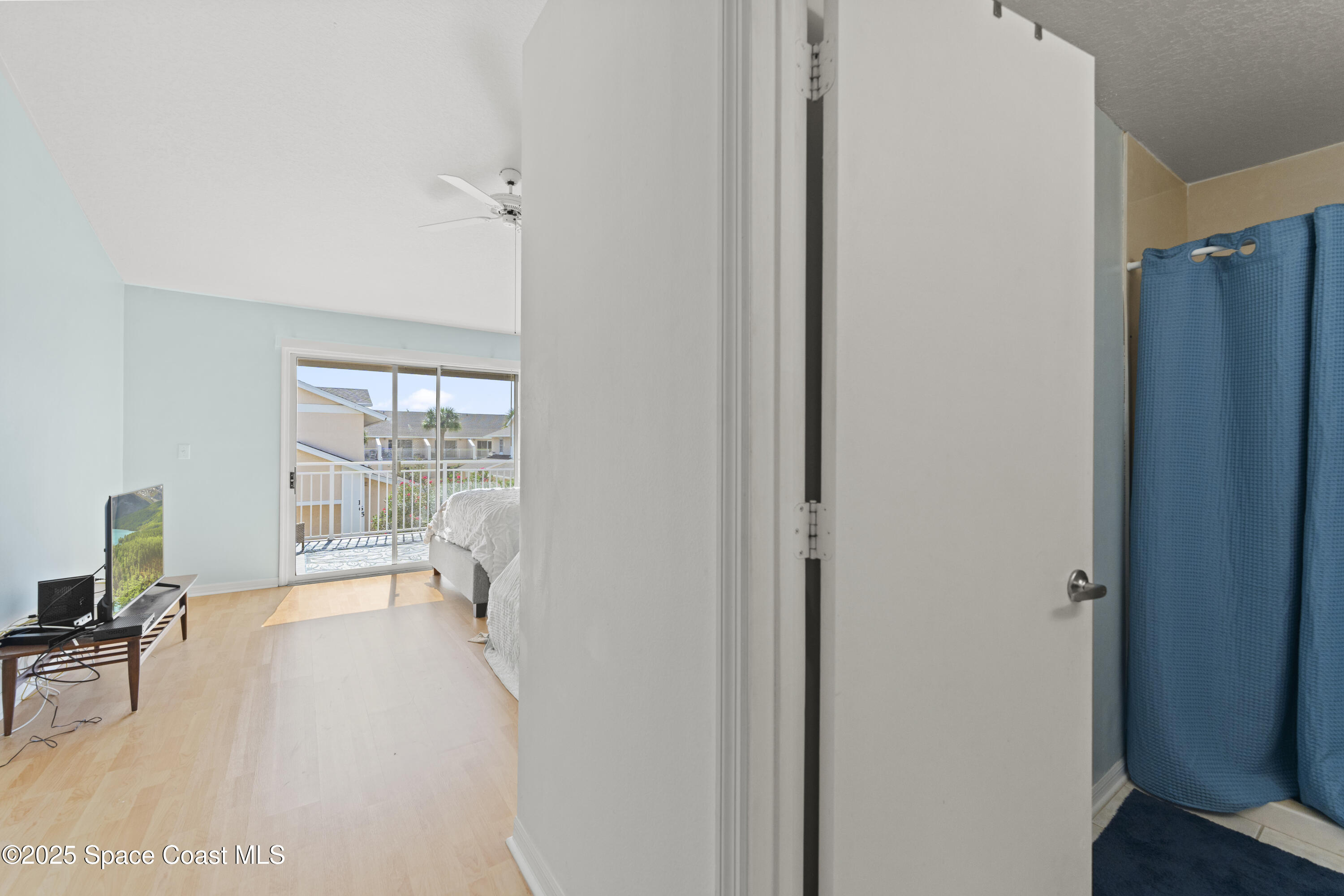 135 Escambia Lane, Unit 204 Cocoa Beach, FL 32931 - Photo 13 of 23 a view of an empty room with a window