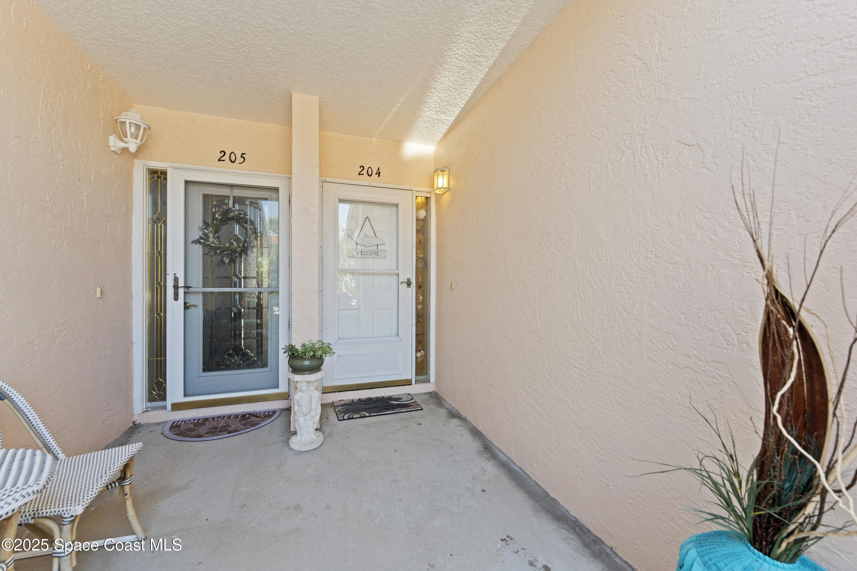135 Escambia Lane, Unit 204 Cocoa Beach, FL 32931 - Photo 2 of 23 a view of an empty room