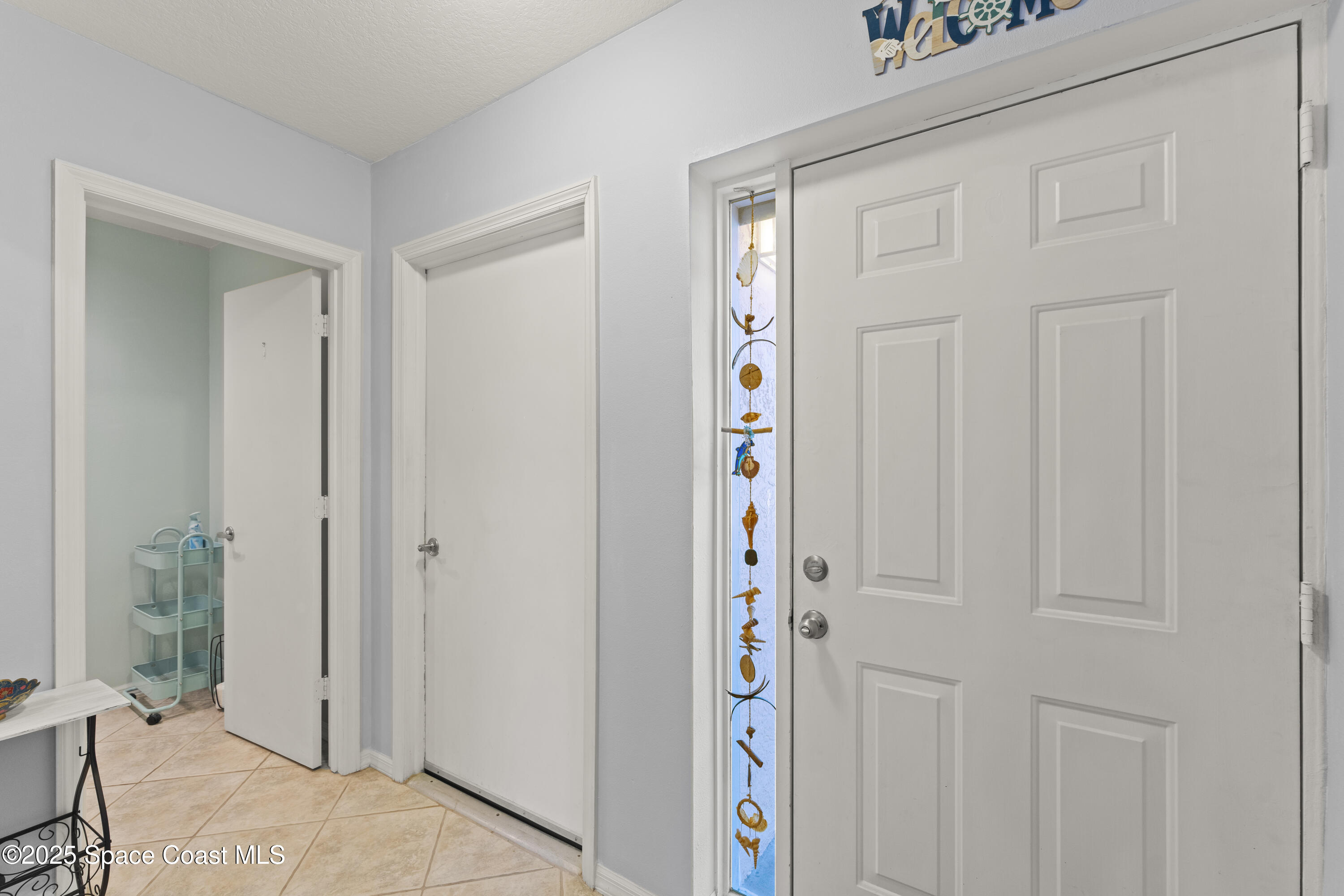 135 Escambia Lane, Unit 204 Cocoa Beach, FL 32931 - Photo 4 of 23 a bathroom with a shower