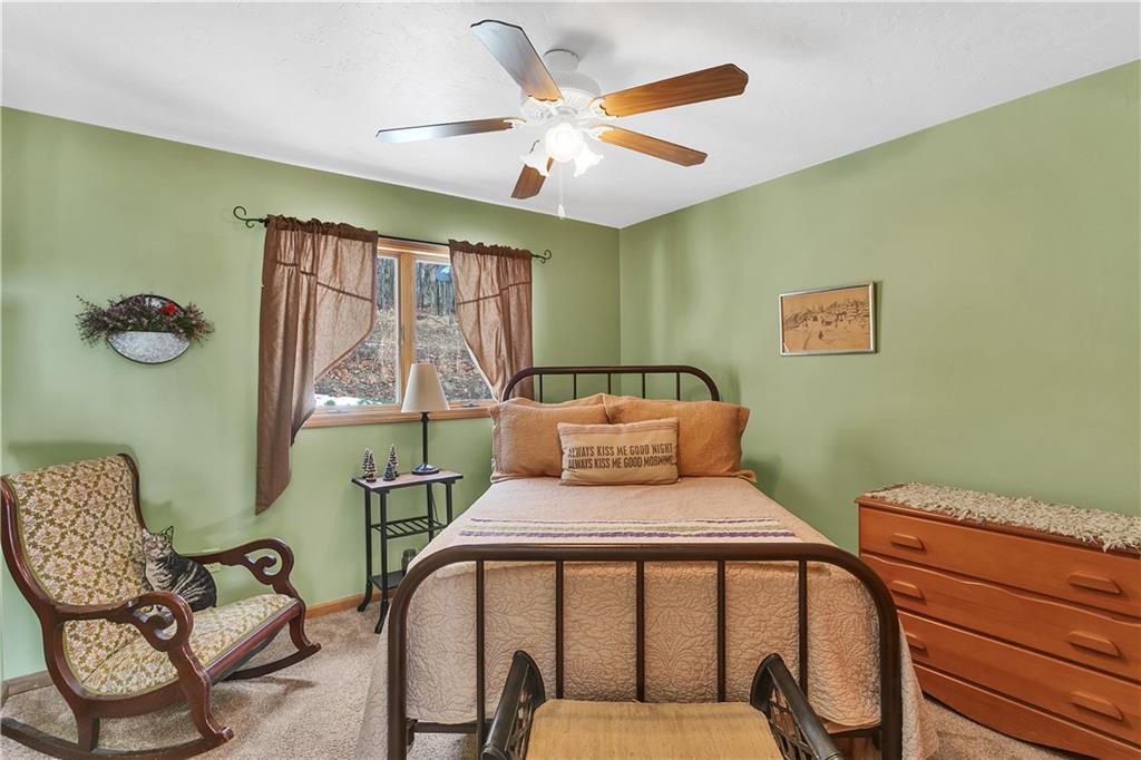 837 Girty Road Shelocta, PA 15774 - Photo 12 of 24 a bedroom with furniture and a window