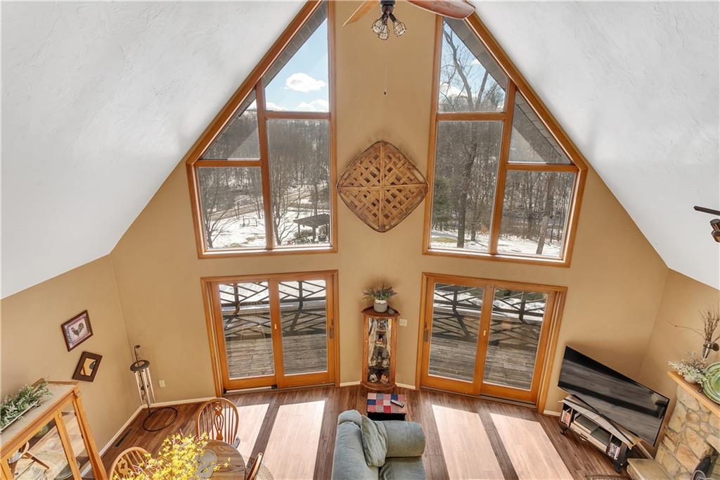 837 Girty Road Shelocta, PA 15774 - Photo 15 of 24 a view of an entryway with wooden floor windows and a livingroom