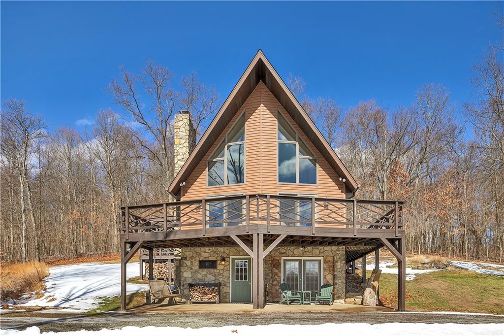837 Girty Road Shelocta, PA 15774 - Photo 19 of 24 a view of a house with large windows