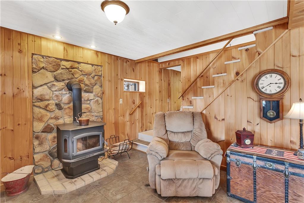 837 Girty Road Shelocta, PA 15774 - Photo 2 of 24 a living room with furniture and a clock