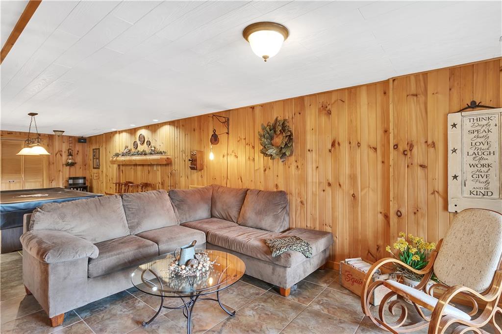837 Girty Road Shelocta, PA 15774 - Photo 3 of 24 a living room with furniture and a painting on the wall