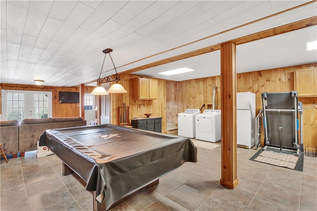 837 Girty Road Shelocta, PA 15774 - Photo 5 of 24 a living room with stainless steel appliances kitchen island granite countertop furniture and a chandelier