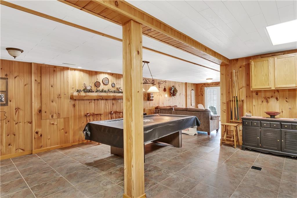 837 Girty Road Shelocta, PA 15774 - Photo 6 of 24 a large bedroom with a large window and furniture