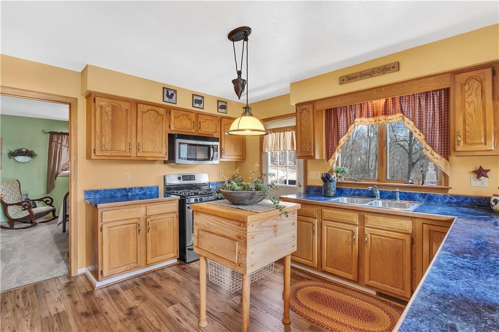 837 Girty Road Shelocta, PA 15774 - Photo 8 of 24 a kitchen with stainless steel appliances granite countertop a stove and a sink