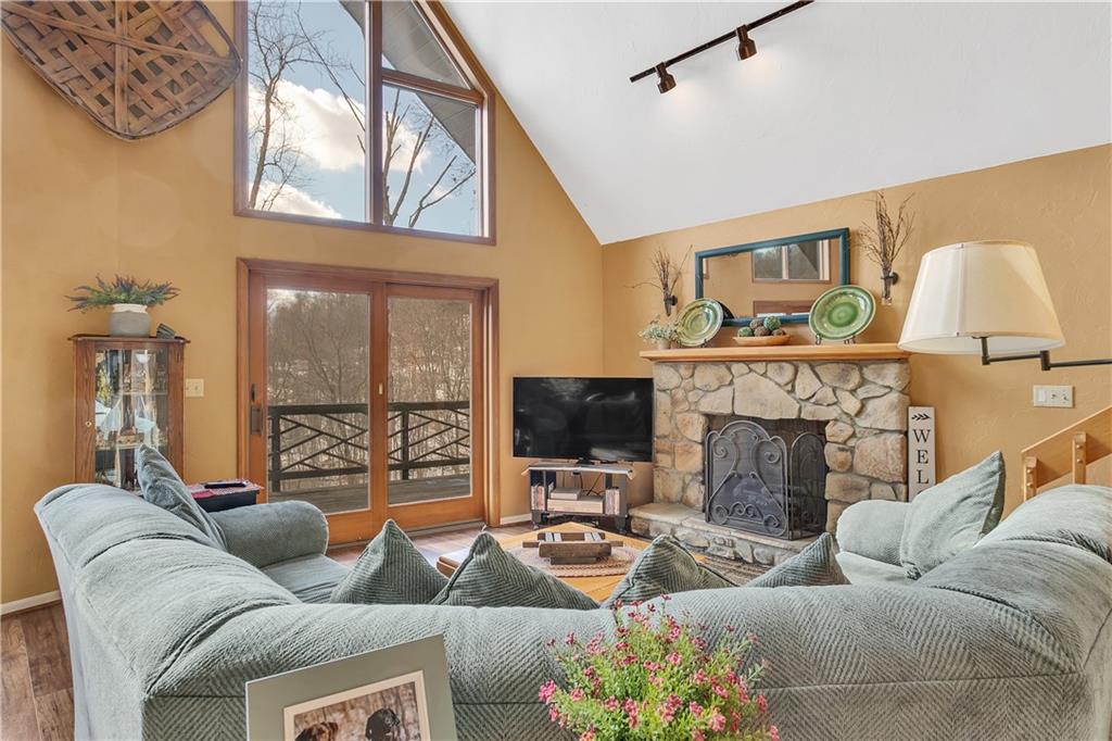 837 Girty Road Shelocta, PA 15774 - Photo 9 of 24 a living room with furniture and a fireplace